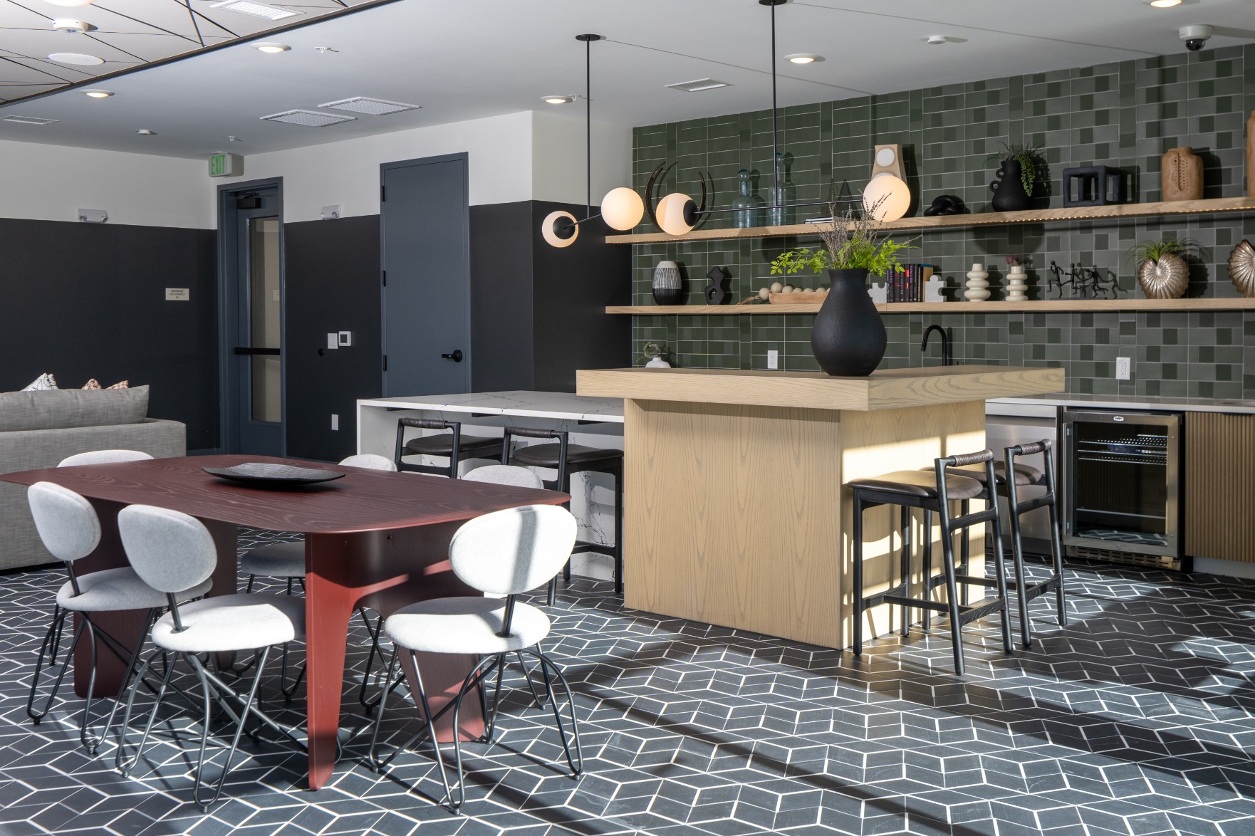 Catering kitchen and dining table in the sky lounge at Legacy Metro 525