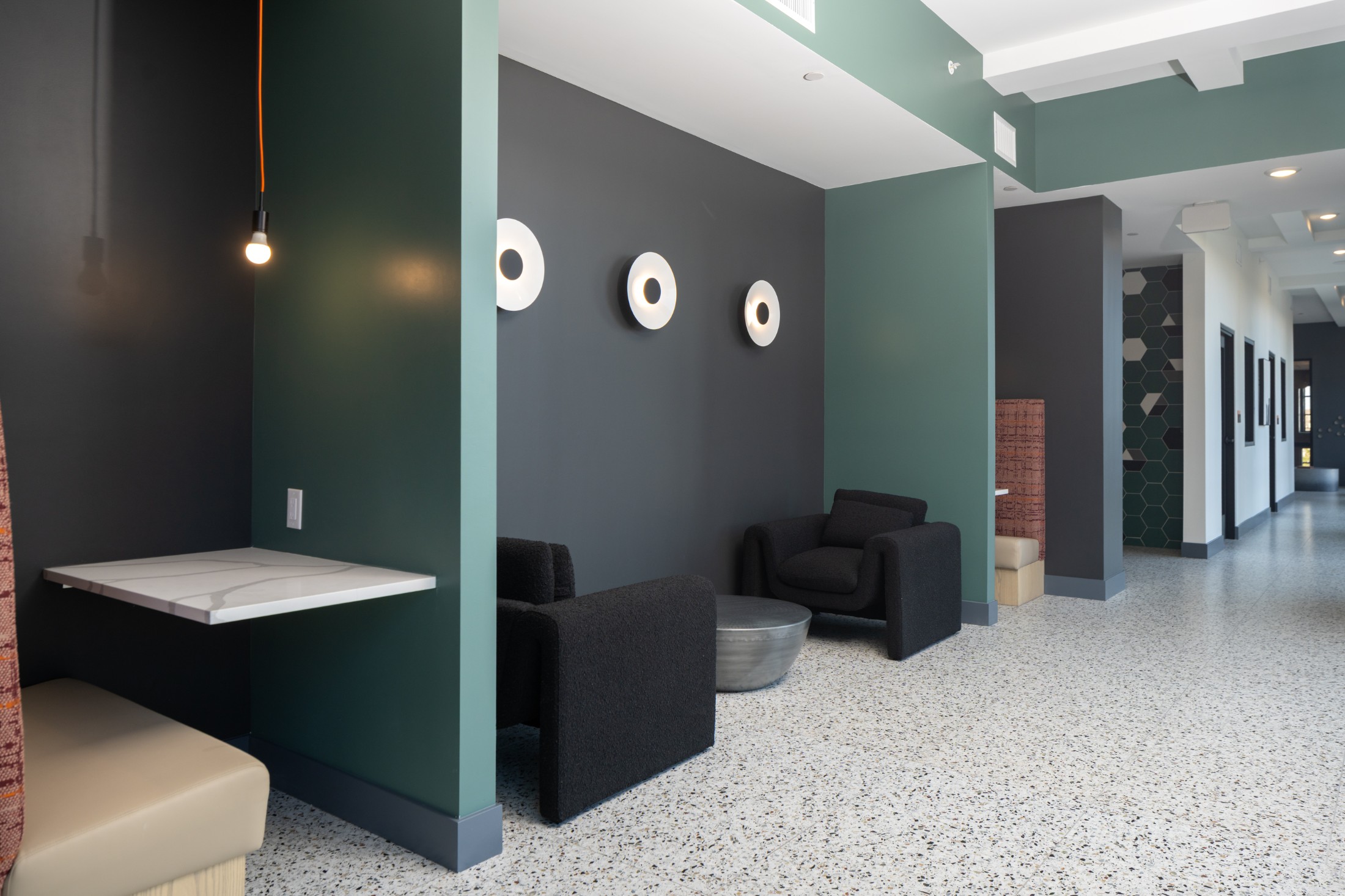 Co-working area with work pods at Legacy Metro 525