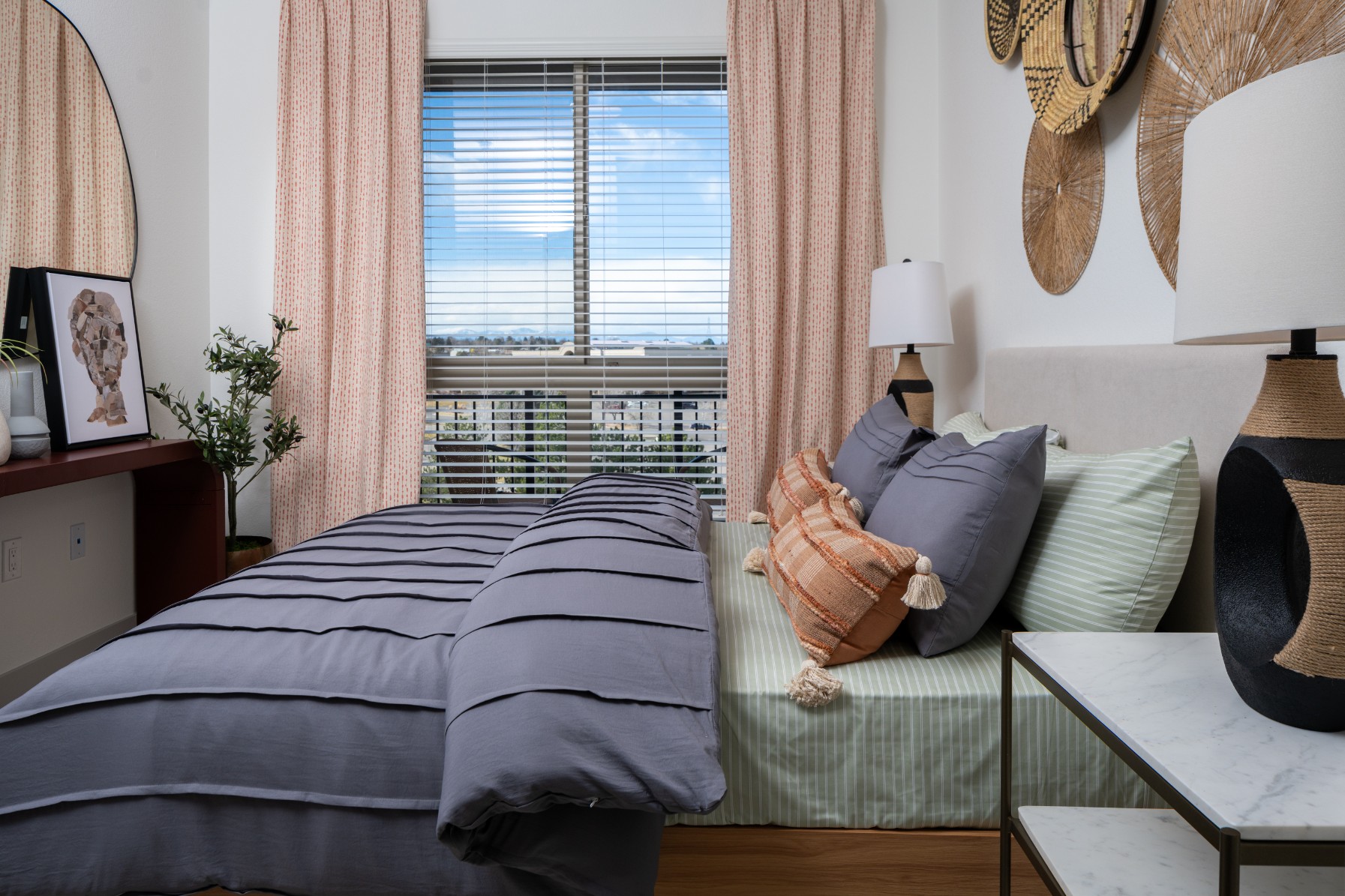 Model bathroom with walk-in shower at Legacy Metro 525