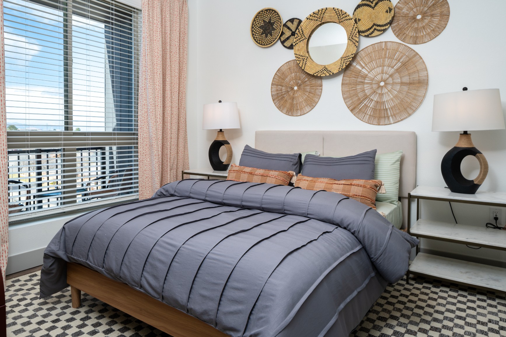 Model bedroom with private balcony at Legacy Metro 525