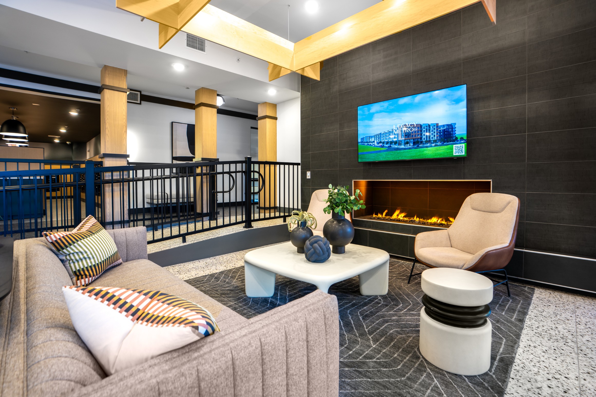 Fireplace seating in the lobby of Legacy Metro 525