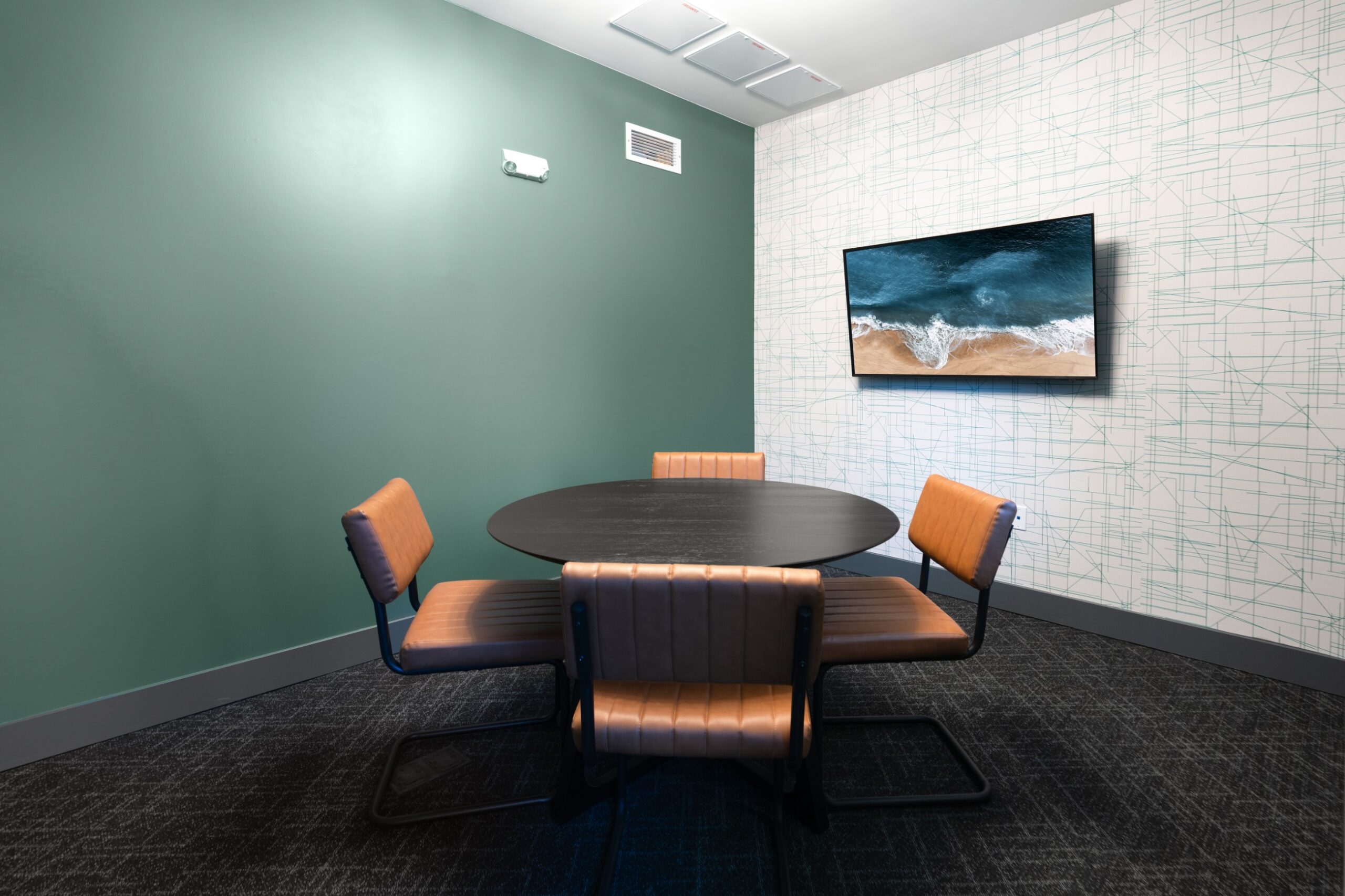 Private meeting room with flatscreen at Legacy Metro