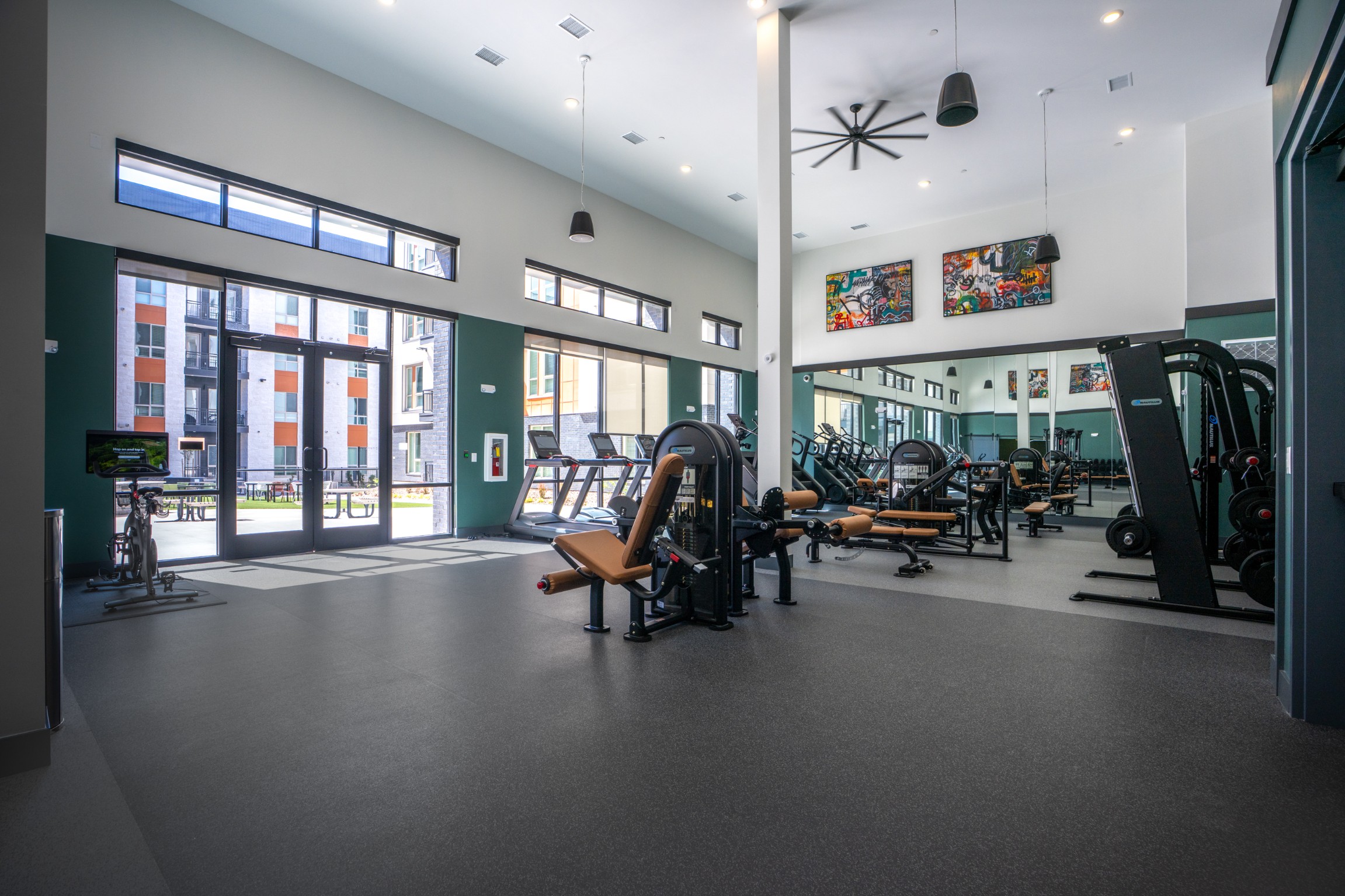 Fitness center with weight training and cardio equipment