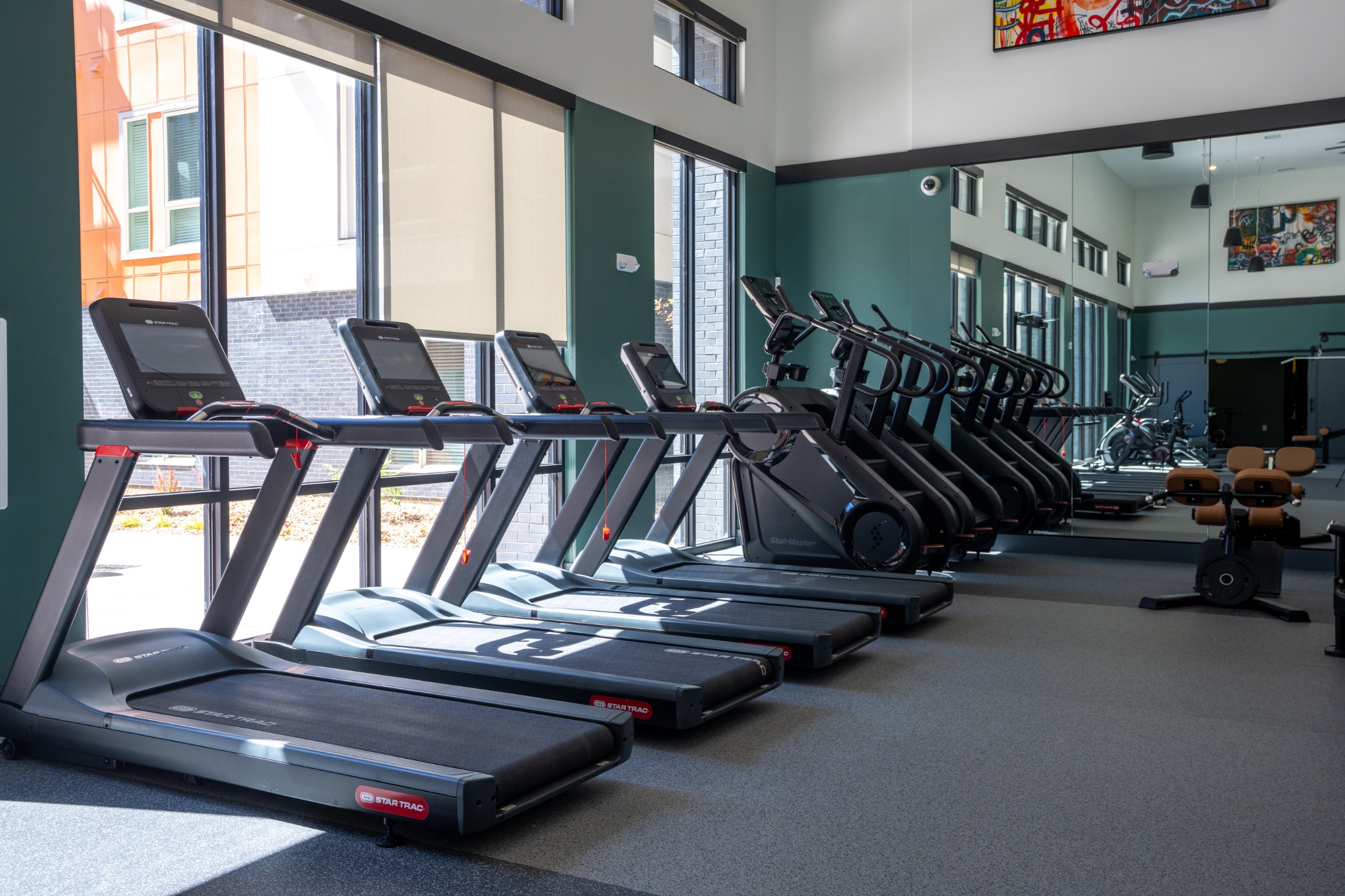 Fitness center with cardio equipment at Legacy Metro 525