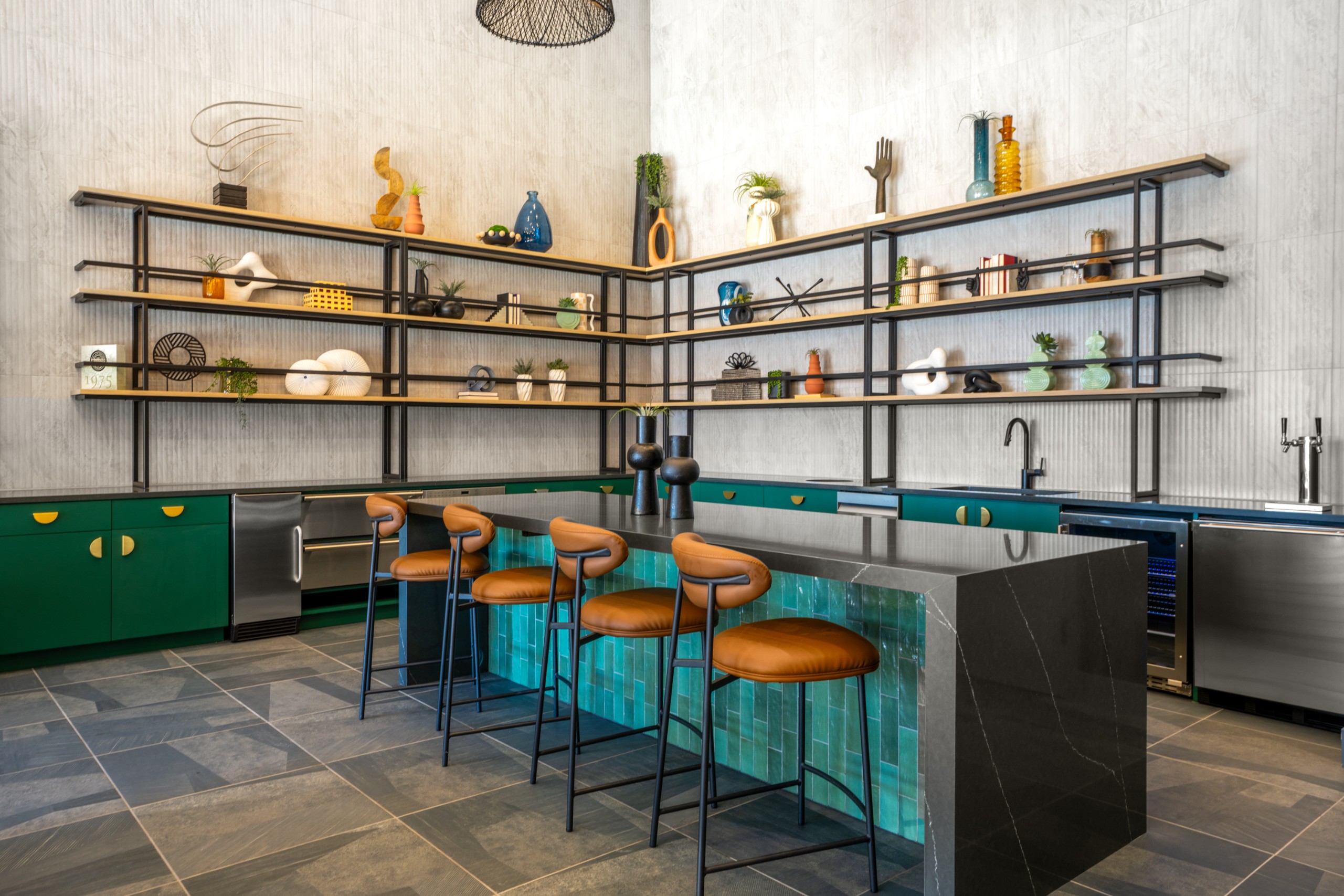 Community kitchen with bar seating at Legacy Metro