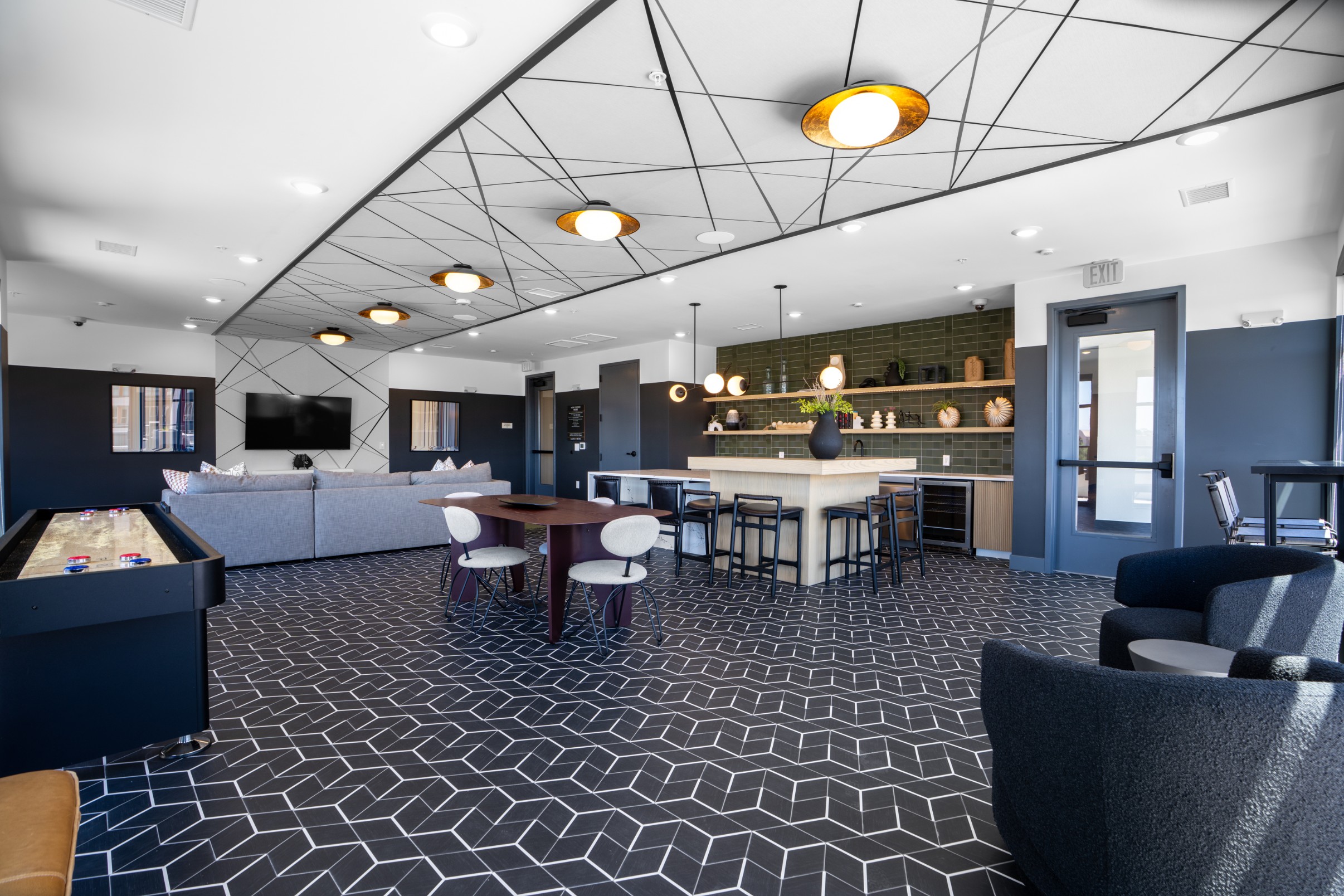 Clubroom with catering kitchen and shuffleboard table