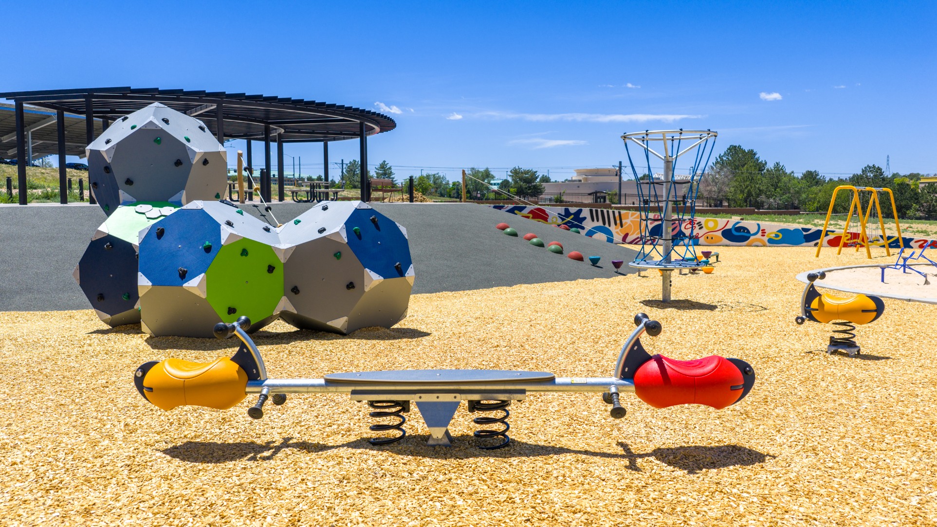 Colorful playground equipment at Legacy Metro