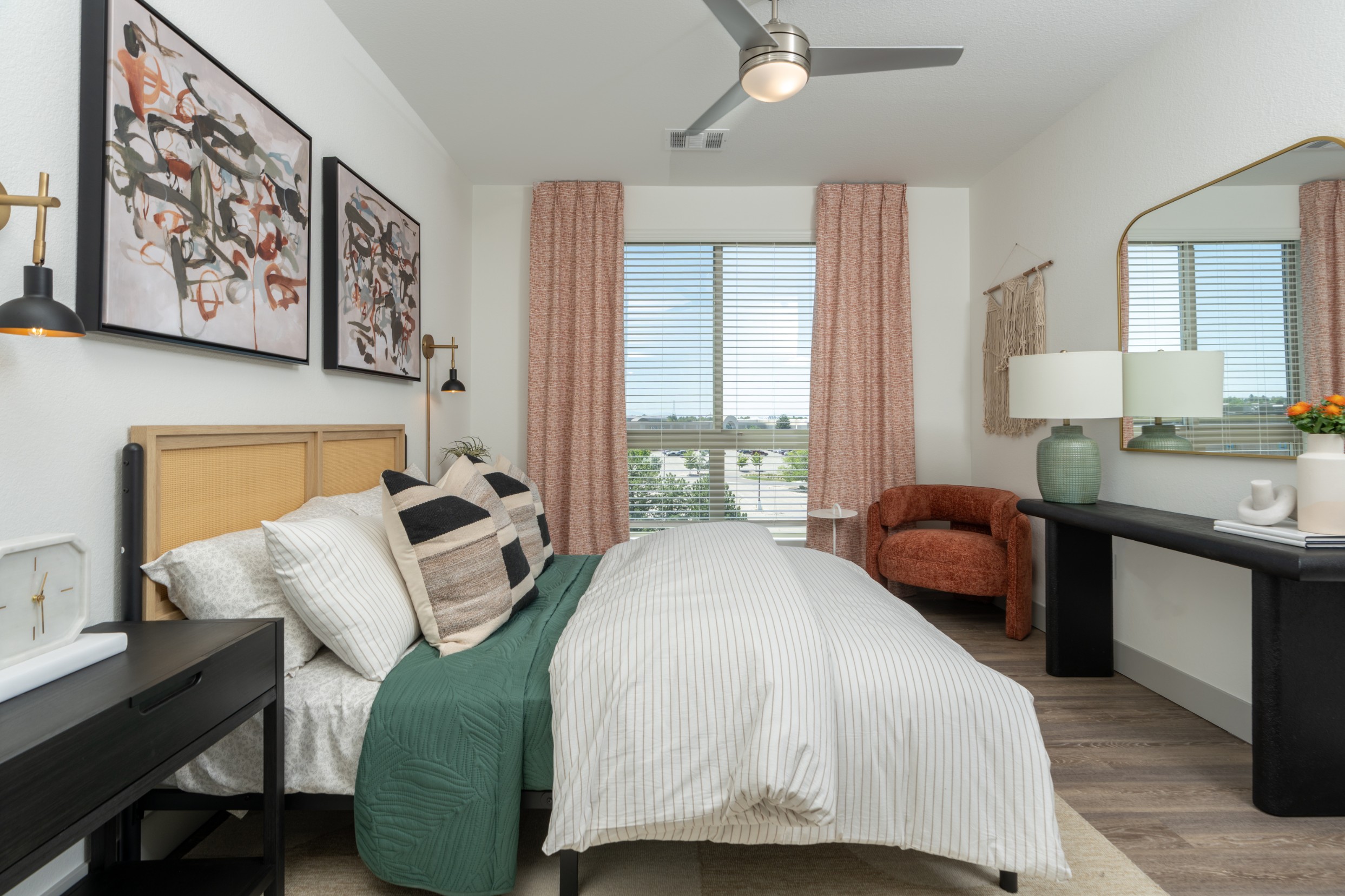 Model bedroom with a ceiling fan