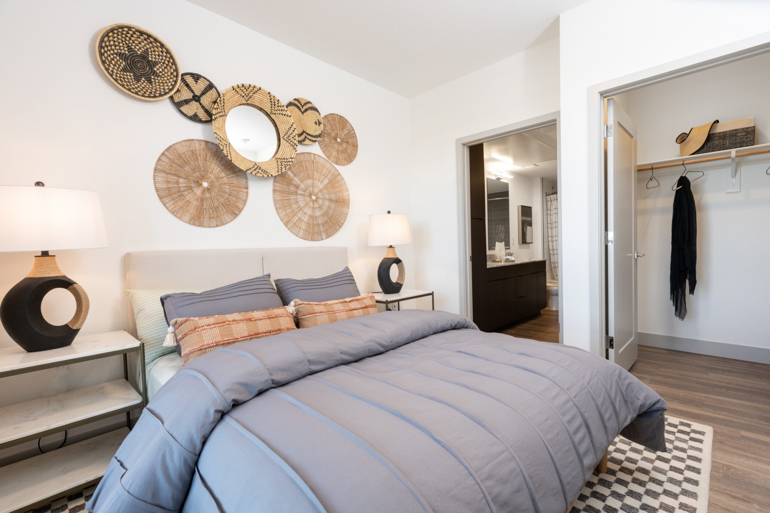 Model bedroom with oversized closet and attached bathroom